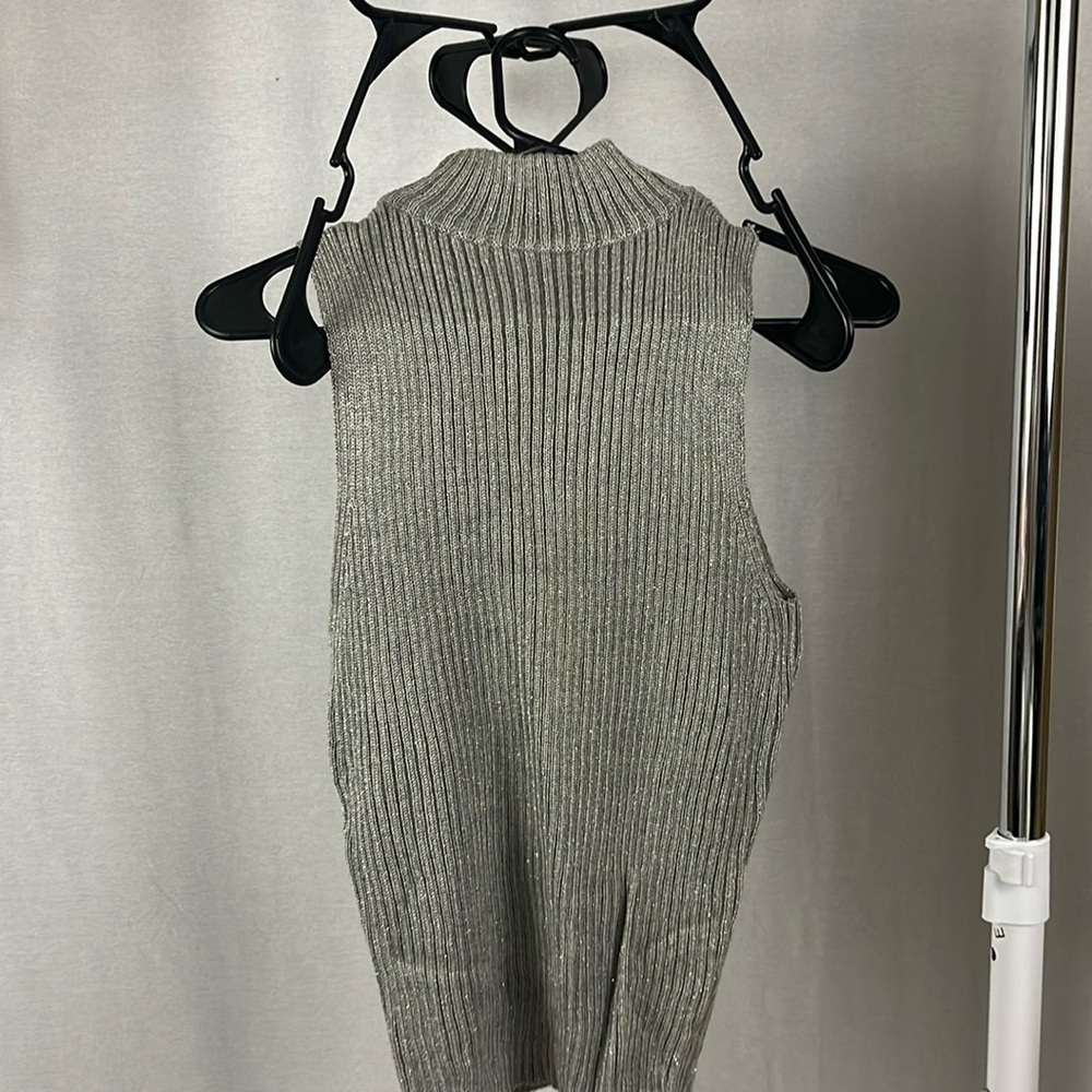 Form fitting turtle neck vest
